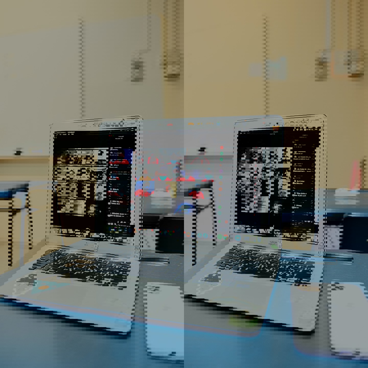 Laptop and phone with zoom call