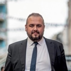 Image of Tom Holvey Chief Economic Advisor