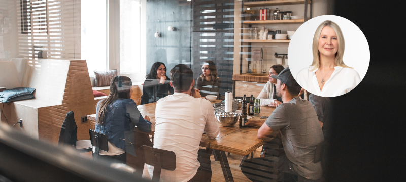 People sitting around a table talking - JBL Blog