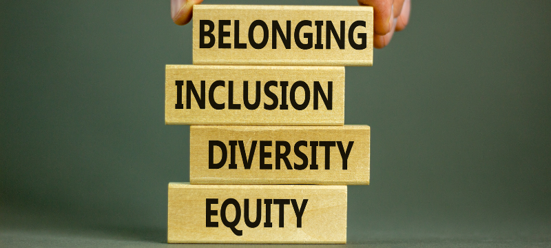 Image of blocks witht he words belonging, inclusion, diversity and equity written on them